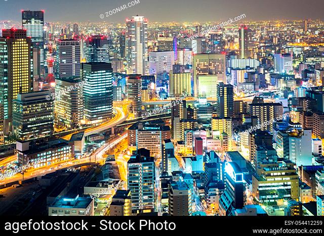 Osaka skyline and skyscraper building at night Japan