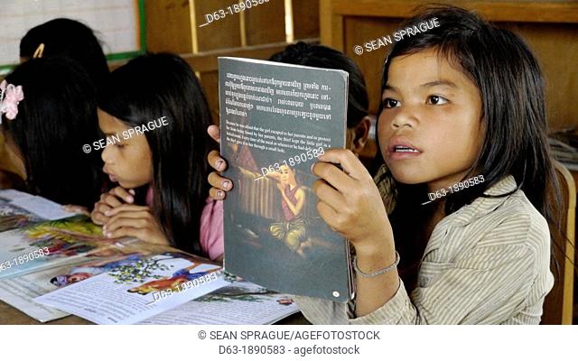 CAMBODIA. Projects of DPA in Stung Treng, supported by SCIAF. Katot village  Girls at the village literacy centre