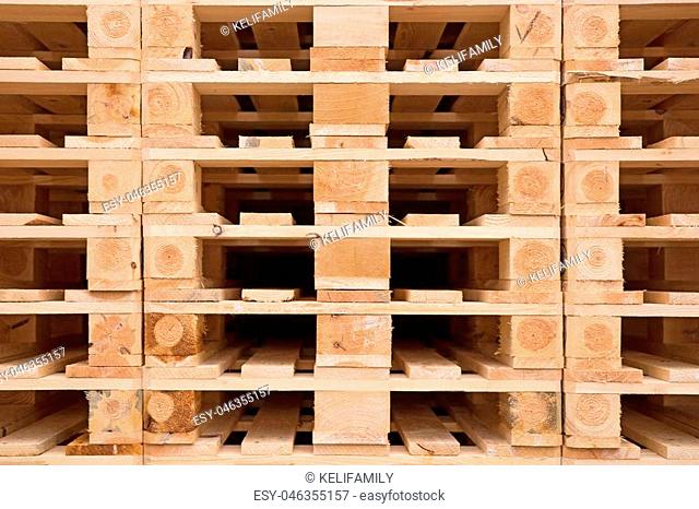 Structure and texture of wooden pallets in stock