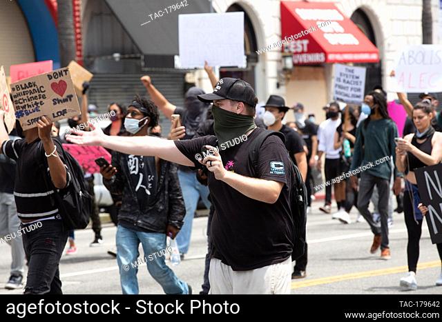 Los Angeles, CA - June 2, 2020: Demonstrators attend the George Floyd Black Lives Matter Protest on June 2, 2020 on Hollywood Blvd in Los Angeles, California