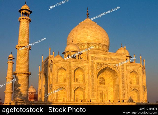 Taj Mahal seen from the East at sunrise on a chilly February day. The famous mausoleum has been built by the Mughal emperor of India Shah Jahan (Muhammad...