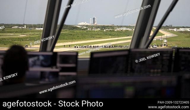 In this photo released by the National Aeronautics and Space Administration (NASA), Seen through the windows of firing room four of the Launch Control Center