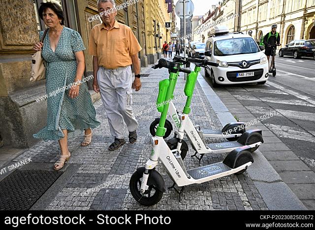 Shared electric scooters obstructing the sidewalk in Hybernska street, 24 August 2023, Prague. (CTK Photo/Vit Simanek)