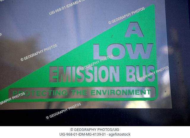 A Low Emission Bus, protecting the environment, sign on back windscreen