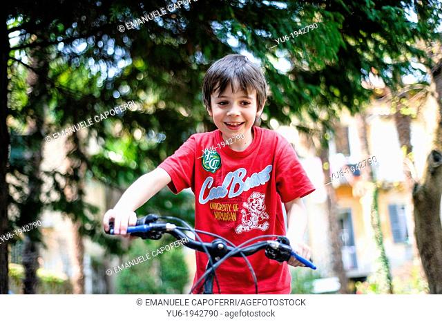 Child portrait while riding bicycle