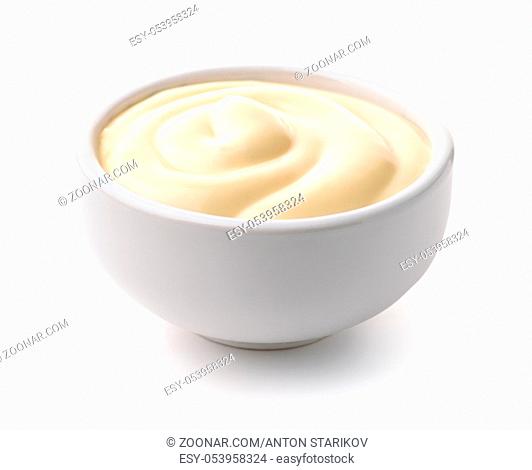 Ceramic dip bowl full of mayonnaise isolated on white