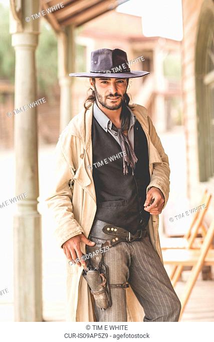 Portrait of cowboy on porch on wild west film set, Fort Bravo, Tabernas, Almeria, Spain