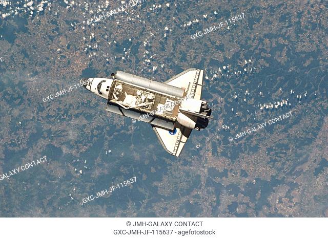 One of the Expedition 27 crew members aboard the International Space Station (ISS) recorded this image of the space shuttle Endeavour as the two spacecraft made...