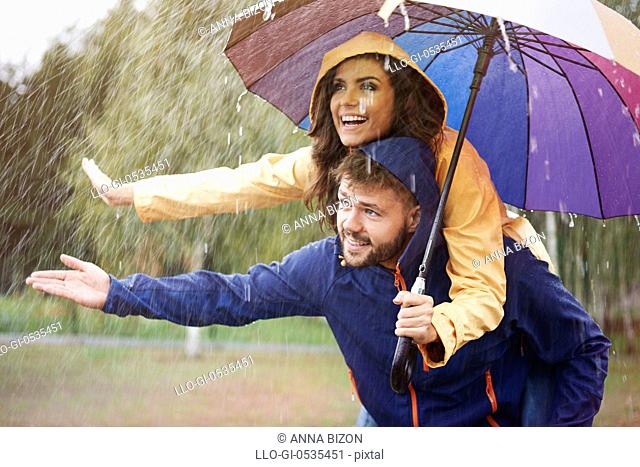 Let's hide under an umbrella in rain. Debica, Poland