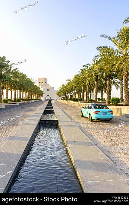 Karwa taxi approaching the Museum of Islamic Art, Doha, Qatar