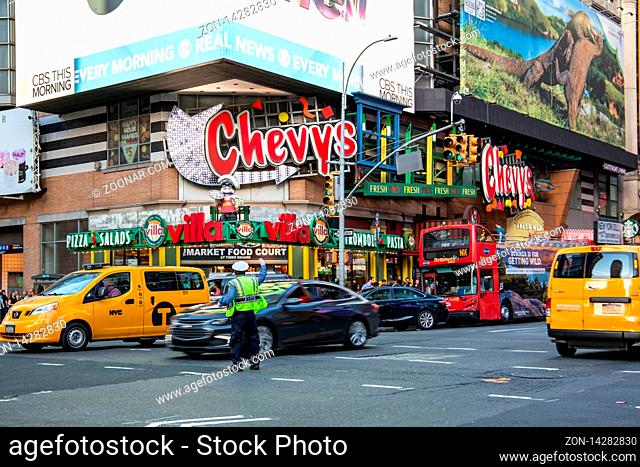 New York City / USA - JUL 13 2018: Times Square street view at rush hour in midtown Manhattan