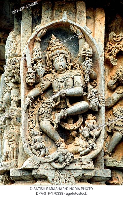 God shiva statue carved on hoysaleswara temple ; Halebid Halebidu ; Hassan ; Karnataka ; India