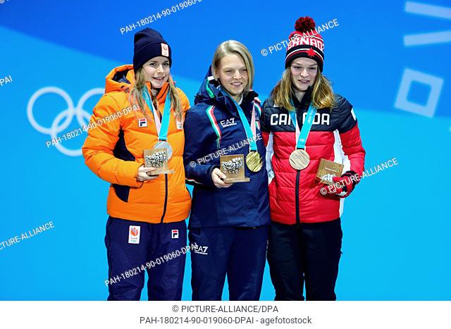 Second-placed Yara van Kerkhoff (left to right) from the Netherlands, first-placed Arianna Fontana from Italy and third-placed Kim Boutin from Canada standing...