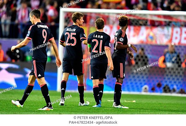 Munich's Robert Lewandowski (L-R), Thomas Mueller, Philipp Lahm and David Alaba after the Champions League semi-final match between Atletico Madrid and Bayern...