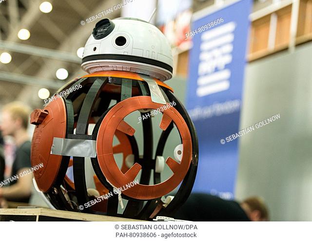 An incomplete model of the robot BB8 from the Star Wars movie franchise seen at the booth of the online community RPF at the MCM Comic Con in Hanover,  Germany