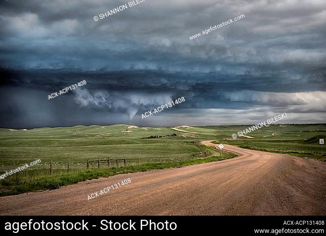 Tornado touches down over windy road near Cheyanne Wyoming United States