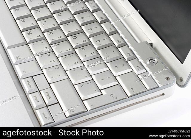 silver laptop keyboard closeup