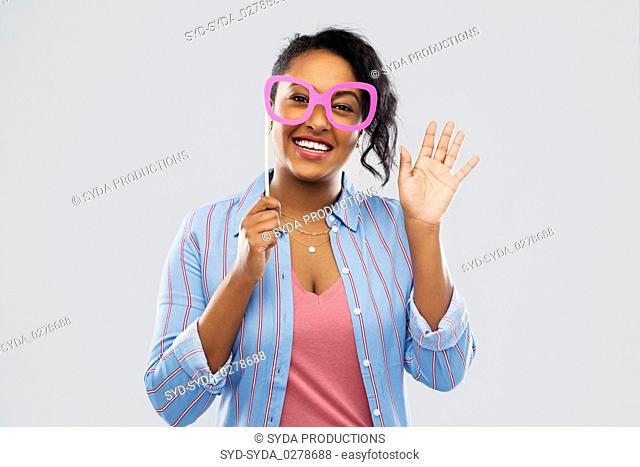 happy african american woman with big glasses