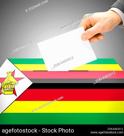 Voting concept - Ballot box painted into national flag colors - Zimbabwe
