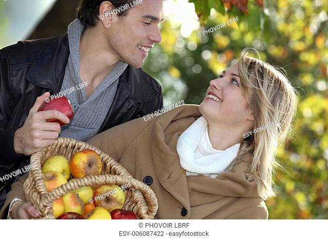 Couple with apple