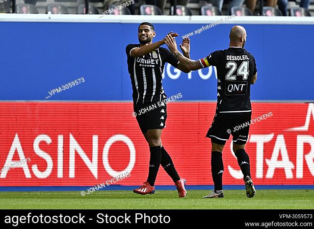 Charleroi's Gjoko Zajkov and Charleroi's Dorian Dessoleil celebrate after scoring during a soccer match between OH Leuven and Sporting Charleroi