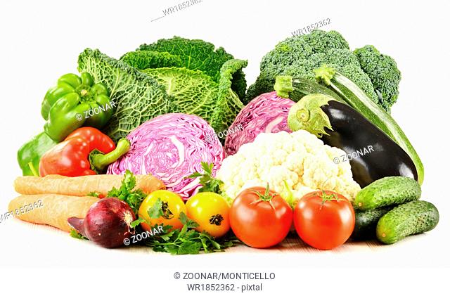 Composition with variety of fresh organic vegetables isolated on white