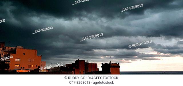 Stormy sky at sunset in El Masnou, Maresme area, Barcelona, Spain