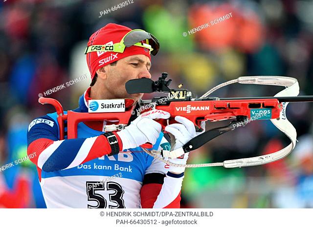 Norway's Ole Einar Bjoerndalen at the shooting range during the sprint competition at the Biathlon World Championships, in the Holmenkollen Ski Arena, Oslo