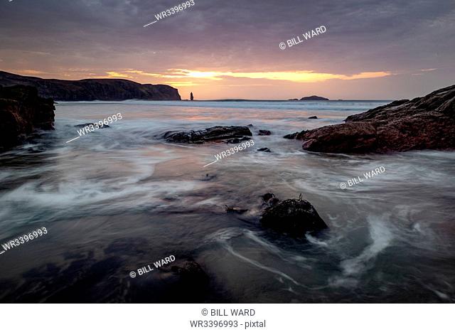 Am Buachaille sea stack at sunset, Sandwood Bay, Sutherland, Scotland, United Kingdom, Europe