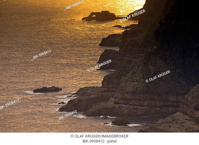 Cliffs and sea in evening light, near Lopra, Suðuroy, Faroe Islands, Denmark