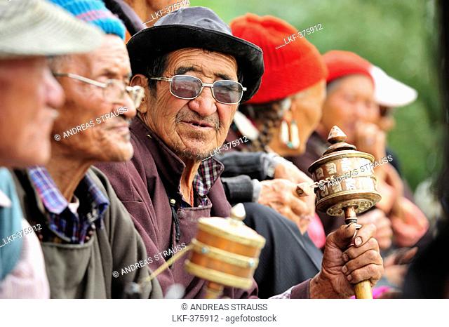 Men with prayer wheels, monastery festival, Phyang, Leh, valley of Indus, Ladakh, Jammu and Kashmir, India