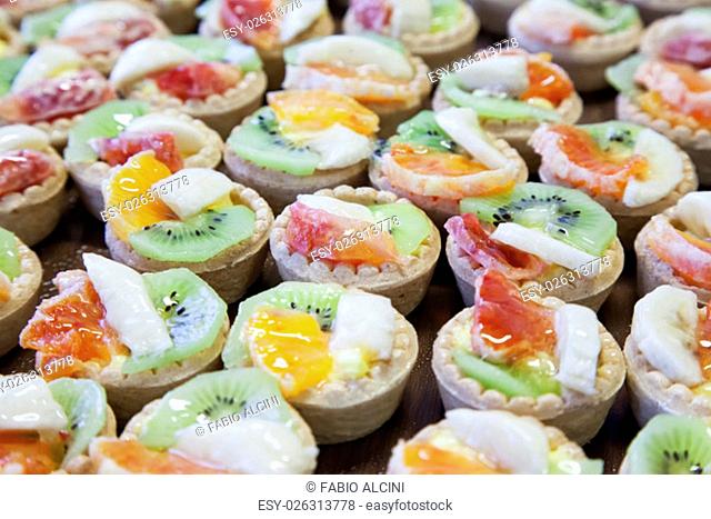 Pastries with various kinds of fruits, horizontal image