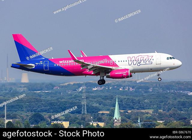 An Airbus A320 aircraft of Wizzair with the registration HA-LYQ at Dortmund Airport (DTM), Dortmund, Germany, Europe
