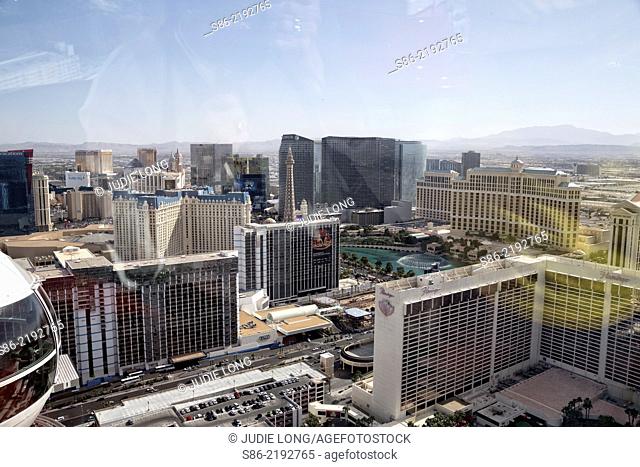 Looking at a Cabin, From an Upper Cabin, at the Top of the Las Vegas High Roller Observation Ferris Wheel, Hotels on the Las Vegas Strip in the Background