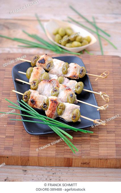 Pork and olives kebabs