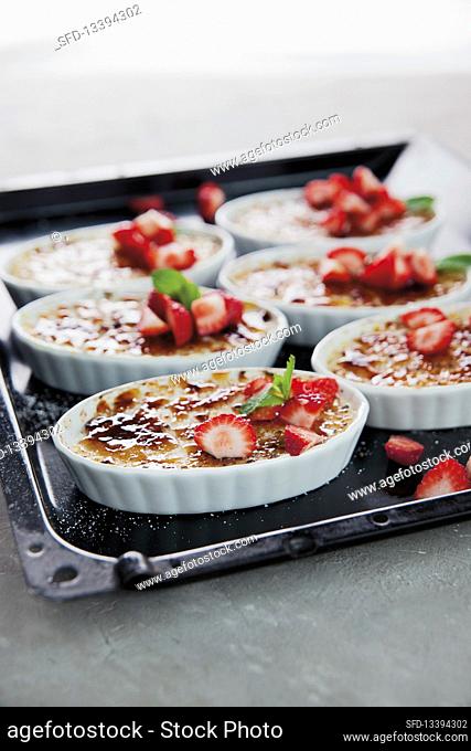 Baked rice pudding with strawberries