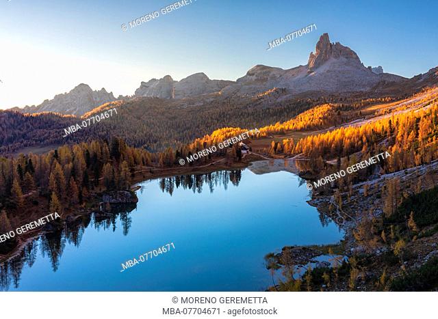 Federa lake in autumn with yellow larches around it, Croda da Lago, Cortina d Ampezzo, Belluno, Dolomites, Veneto, Italy