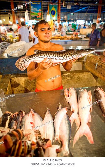 Man Holding Fish, Surubim, Fair of the Fish, Barão de São Domingos Collapse, Amazônia, Manaus, Amazonas, Brazil