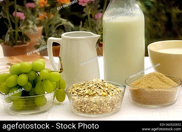 Outdoor table with ingredients for a healthy and energetic breakfast