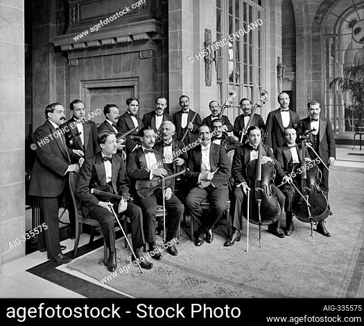 MIDLAND ADELPHI HOTEL, Liverpool. Interior view. Group portrait of the hotel orchestra. The hotel was re-opened in 1914 after partial rebuilding and...