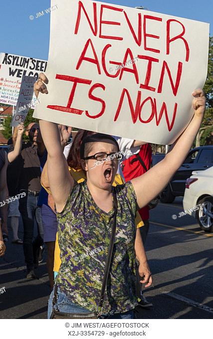 Detroit, Michigan USA - 12 July 2019 - People upset about the separation of immigrant families and the detention of refugees and small children rallied at the...
