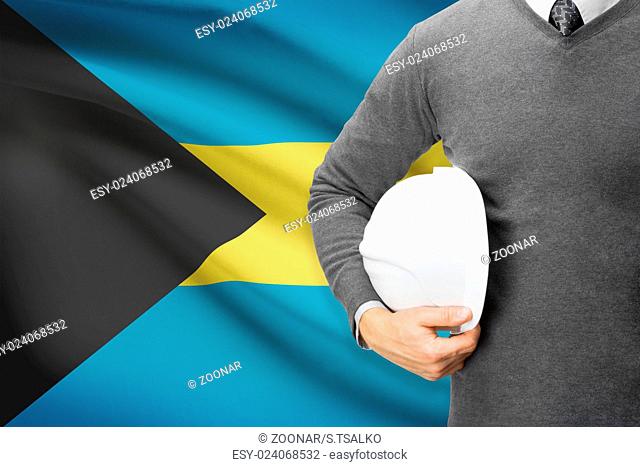 Architect with flag on background - Bahamas