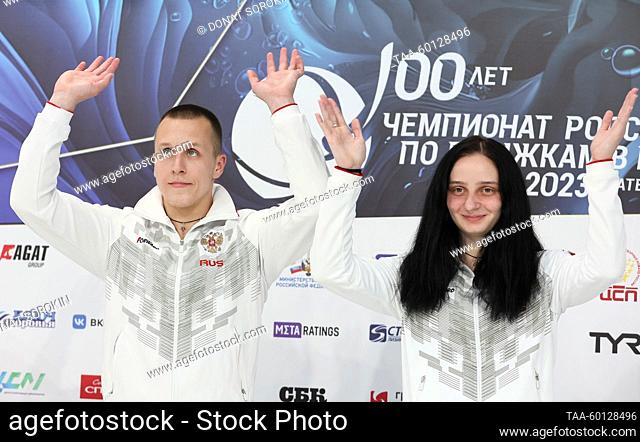 RUSSIA, YEKATERINBURG - JUNE 28, 2023: Gold medalists, divers Ilya Molchanov (L) and Yelizaveta Kuzina attend an award ceremony for the mixed synchronized 3m...
