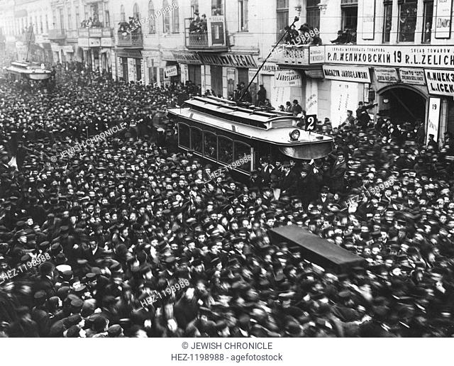 Funeral of Rabbi Elias Haim Meisel, Lodz, Poland, 1912. Mourners pack the streets to see the coffin of the great philanthropist