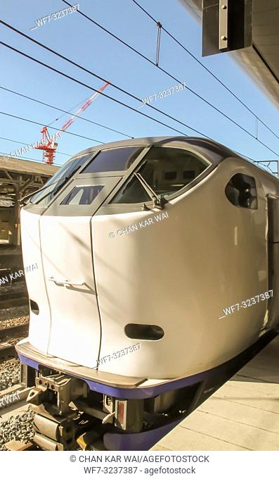 Kyoto, Japan - 2010: The Limited Express Haruka at arrives at Kyoto on a clear day. The Kansai Airport Express Haruka is a fast
