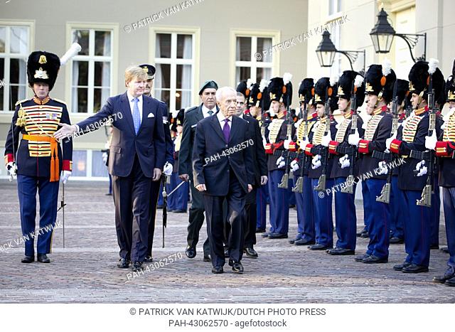 King Willem-Alexander of the Netherlands (L) recieves Israelian president Schimon Peres at Palace Noordeinde during his official visit to the Netherlands in The...