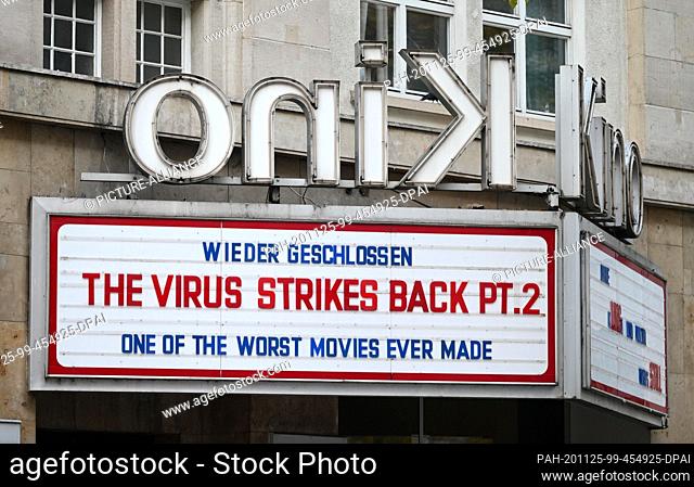 25 November 2020, Baden-Wuerttemberg, Stuttgart: A cinema in the city centre has posted the sentence ""Closed again - The virus strikes back pt