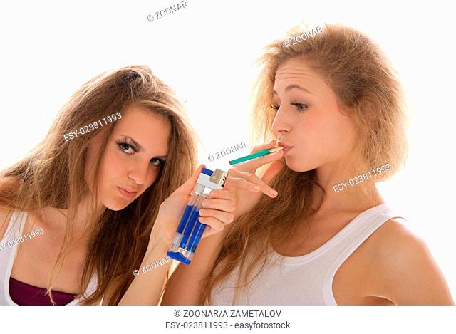Two young women with cigarettes