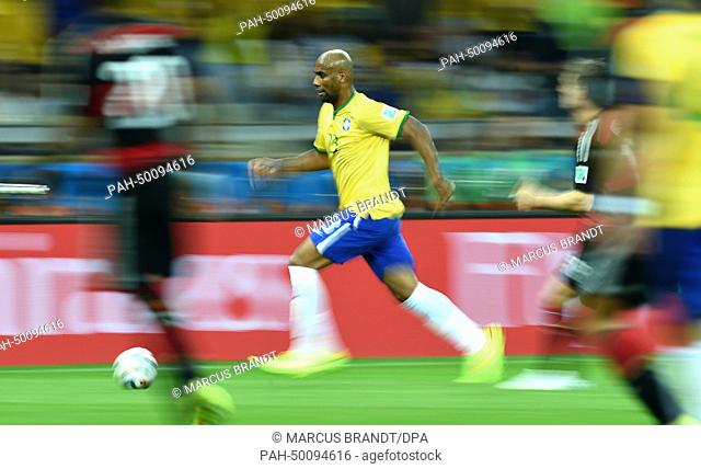 Brazil's Maicon controls the ball during the FIFA World Cup 2014 semi-final soccer match between Brazil and Germany at Estadio Mineirao in Belo Horizonte