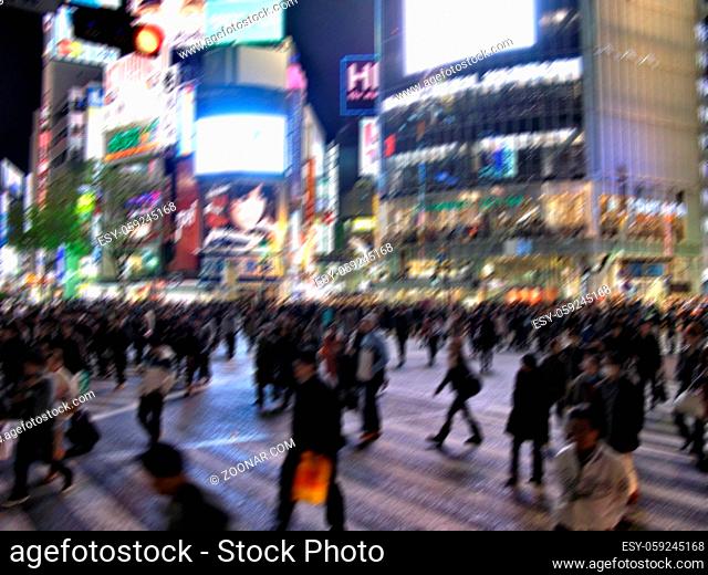 JAPAN, TOKYO - APRIL 17, 2010: Crowds of people in the densely populated district of Shibuya in the center of the capital. Center of Tokyo fashion